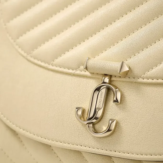 Curve Clutch Buttermilk Quilted Biker Leather Clutch